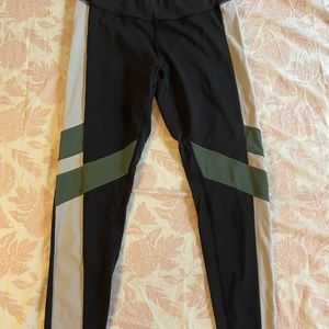 Reebok, L, black, green and white workout pants.